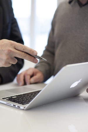 IT consultancy on an Apple laptop