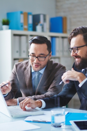 Two men providing IT consultancy services