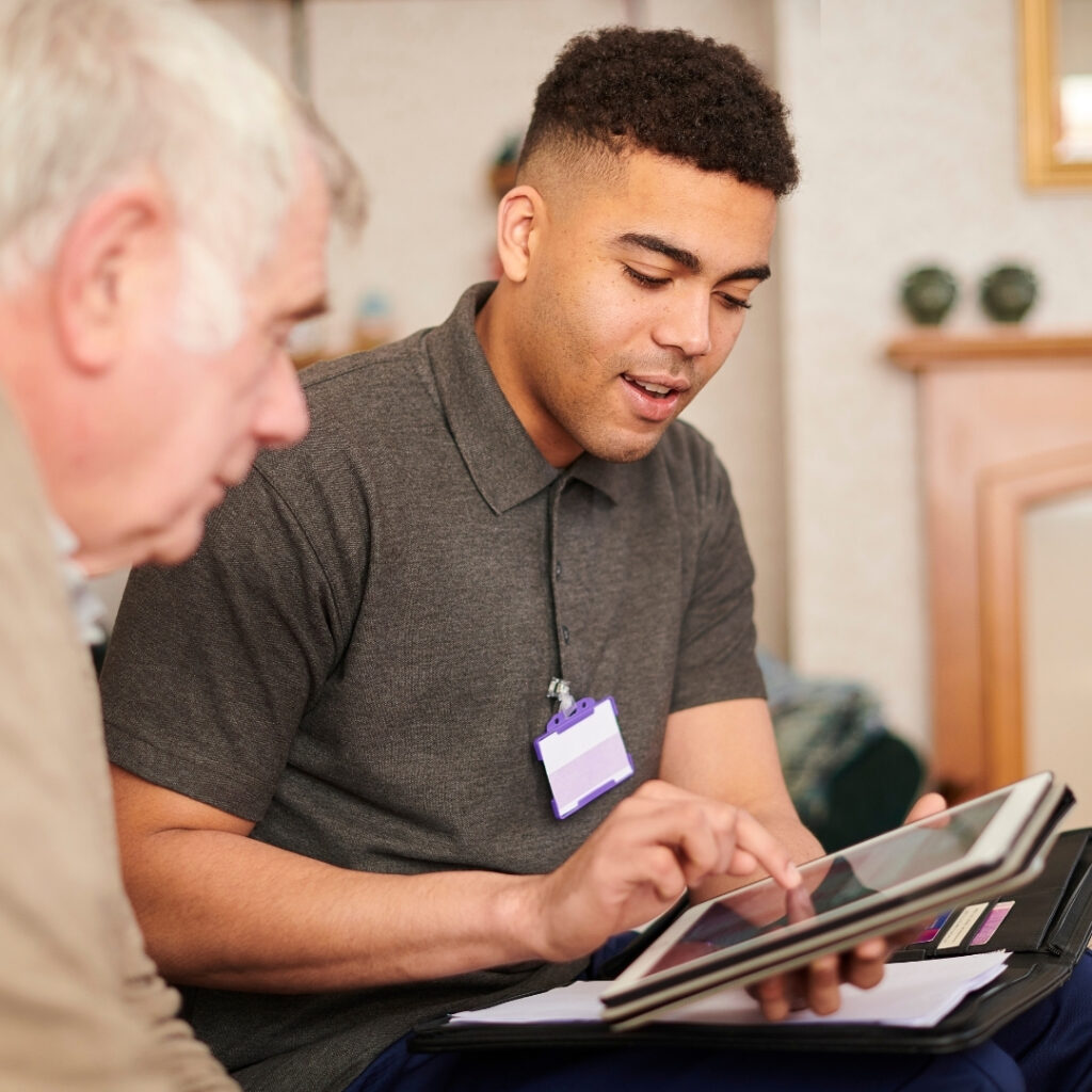 Young CybrSupport man providing IT support on a tablet